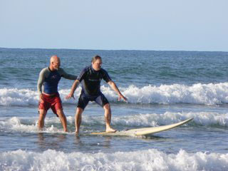 Max Hartshorne surfing with Greg Page