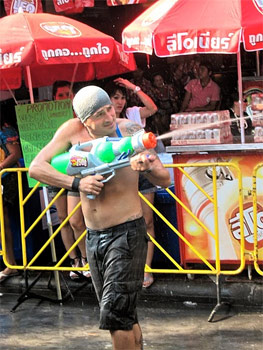 Watergunner at the Songkran Festival in Bangkok. photo by Jean Spoljaric.