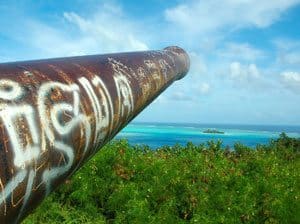 A rusty American artillery gun on Bora Bora.