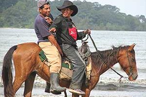 Cowboys on the beach in Panama, Central America.