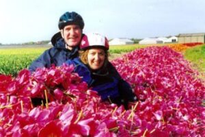 Buried in a pile of red tulip blossoms – photos by Patty McCrary