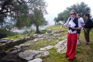 Steff, an amateur archaeologist, standing outside the entrance to Building 4.