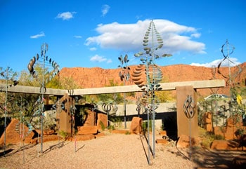 Sculptures spin gently in the wind at The Coyote Gulch Art Village in Kayenta, Utah.