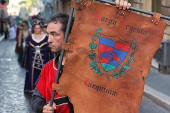 An ancient shield at a feast parade in Tarquinia, Italy. photos by Daniel Foster.