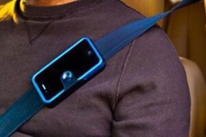 The Strap Caddy that lets you hook your phone to your seatbelt.