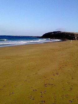 Arrieta Beach, Lanzarote. Red flags indicate it's not safe for swimming