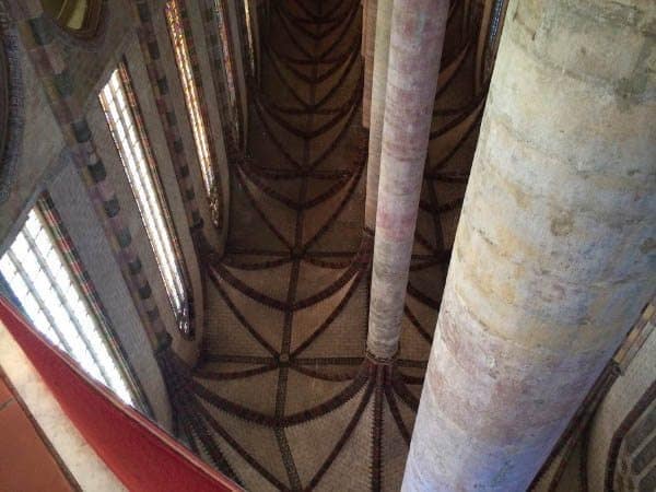 Looking in a mirror in the Basilica looking up.