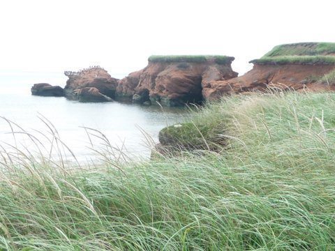 Dramatic red sandstone formations in Magdelen Islands, Canada.