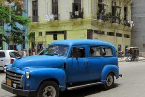 An old van drives the streets of Havana, Cuba.