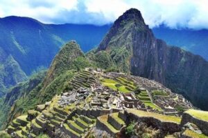 Macchu Picchu, Peru. Climbing mountains and getting the endorphin rush from being there can help you feel more familiar and comfortable while traveling.