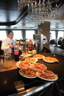 The Crucero Australis ships have large windows in their restaurants.