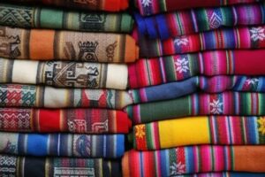 In the Jujuy desert, the hues and textures of the rolling landscape are phenomena of geology and the elements. Brighter yet are the colors of the region’s llama and alpaca wool textiles, often sold at local markets. Photograph by Yadid Levy/Anzenberger/Redux Pictures