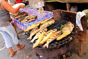 Fresh river fish, grilled up at the Belen market. Julia Bellan photos.