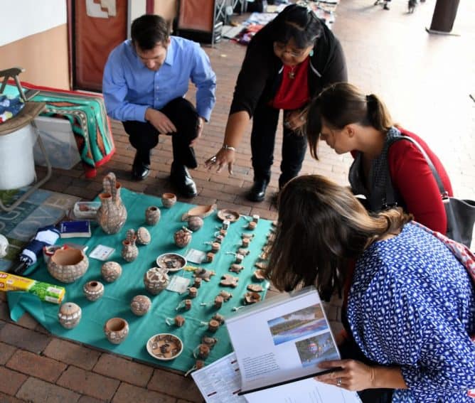 A Chinese woman visiting Santa Fe, New Mexico, wears a Louis