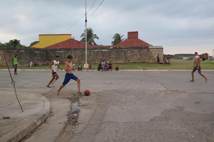 Soccer, played barefoot on the streets, is a common sight in Baracoa Cuba.