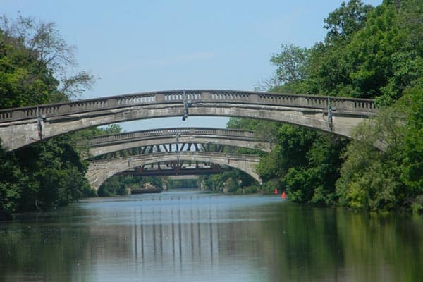 The Western section of the Erie crosses the Genessee River with several pedestrian bridges overhead.