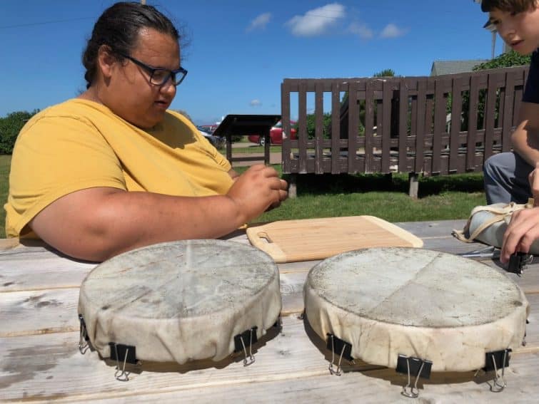 M'kmaq tribe members offer classes in how to make a deer hide drum and share stories about their history and legends on Lennox Island, PEI. 