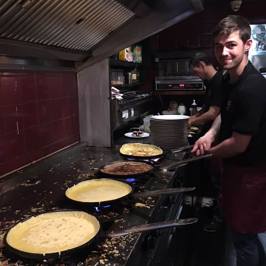 Chef cooking up pancakes to order at The Pancake Bakery in Amsterdam.