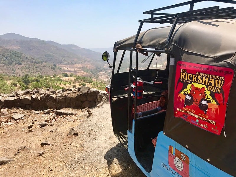 A rickshaw looking out into the Indian wilderness during the Rickshaw Run India