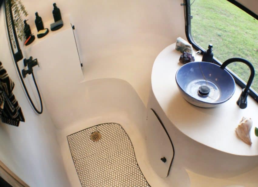 A custom wet bath breaks the mold of a typical cramped RV shower.