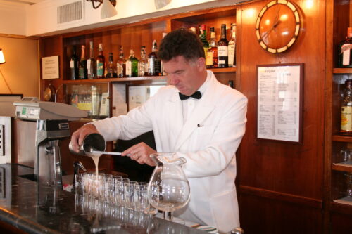 A 'Bellini' cocktail being mixed at Harry's Bar