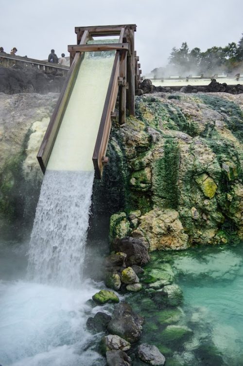 The ending conduit of Yubatake guiding water into the final pool. Image by Richie Henry in Kusatsu Japan