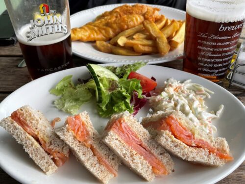 No croissants in Jersey, but you can get smoked salmon on brown bread, fish and chips and cask conditioned ales.