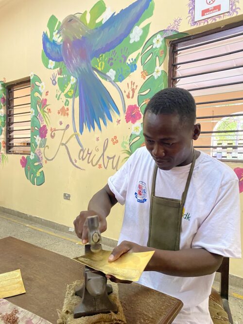 The jewelry artisans at Bombolulu work with copper and silver to trace and cut out various patterns and shapes for their bracelets, earrings and necklaces.