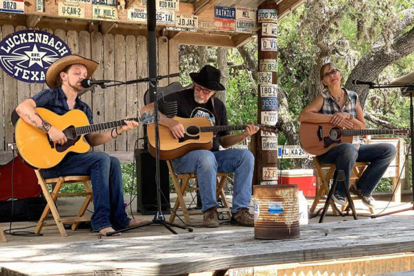 James Sharp, Peter Tory and Shawn Bryan perform on the outdoor stage.