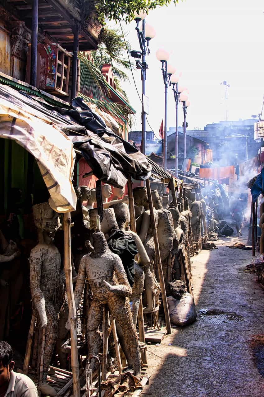 A metal- and stone-smith's bazaar on the edge of Jaipur. The air is filled with dust, as marble workers drill away, creating object d'art.