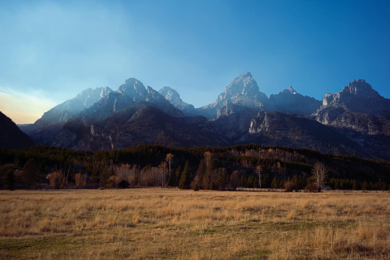 Heading back from Yellowstone late in the day provides a perfect opportunity to catch the Tetons in dramatic backlighting.