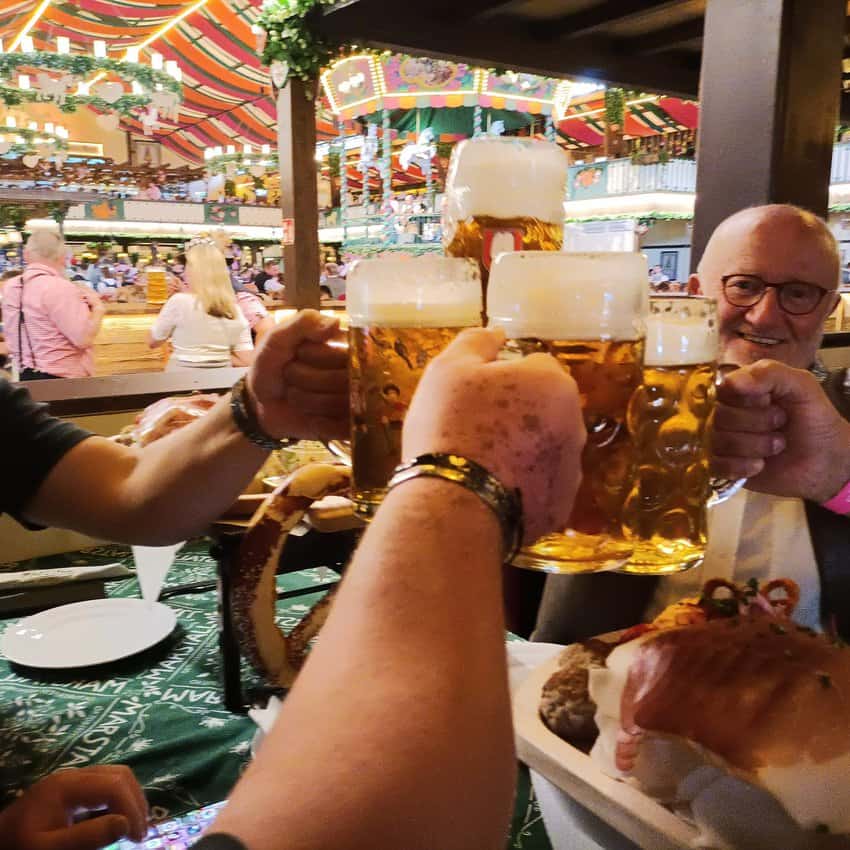 Clunkling beer tankards! Once strangers, now friends.