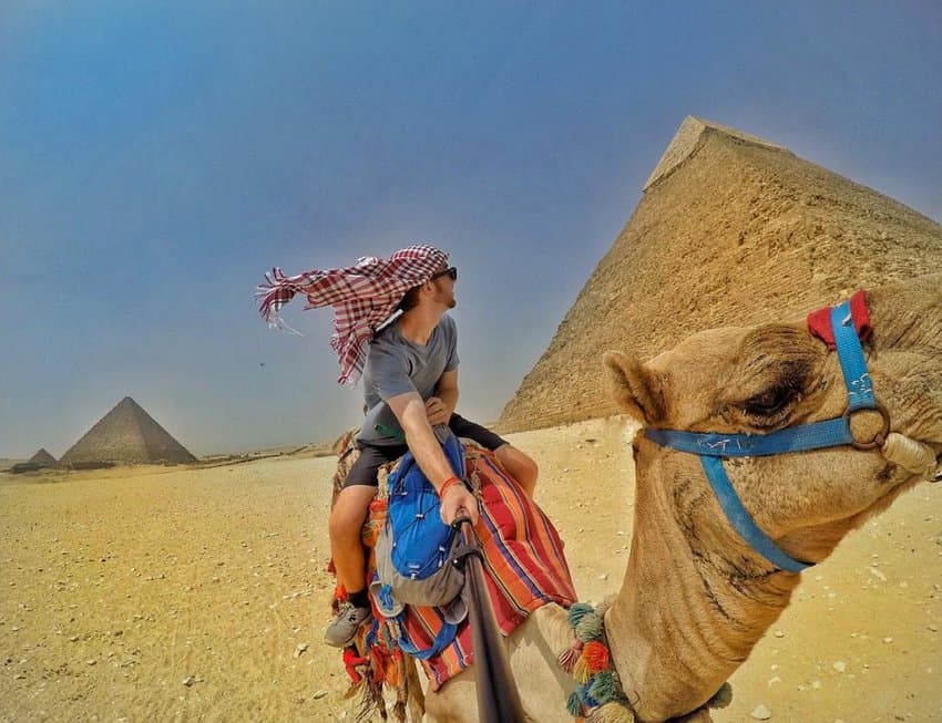 Egypt the pyramids of giza on a camel