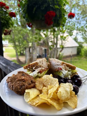 Lunch at the farmhouse is a treat after riding the trails through the Tetons above Linn Canyon Ranch. Photo by Anne Braly