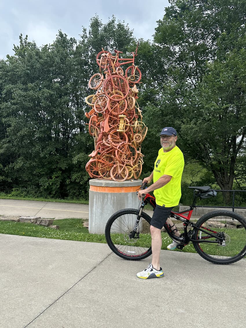 Bike sculpture and air pump by the bike trail