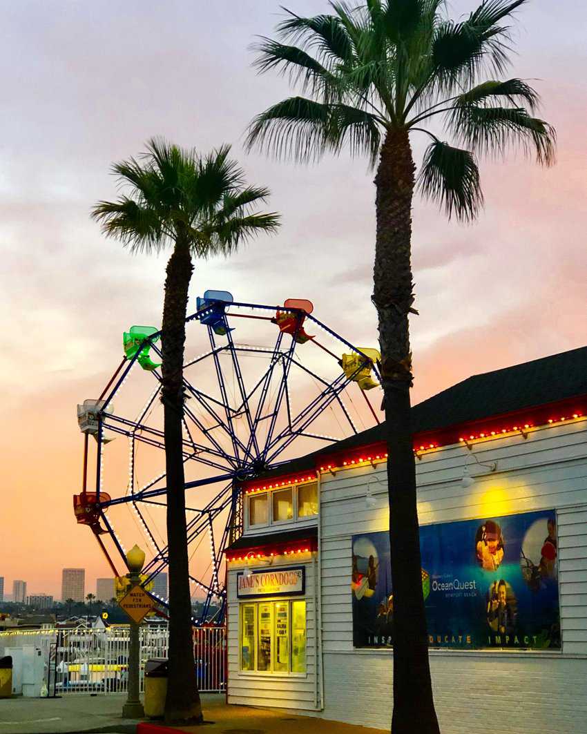 Balboa Village Historic Fun Zone at dusk. Photo by Noreen Kompanik scaled