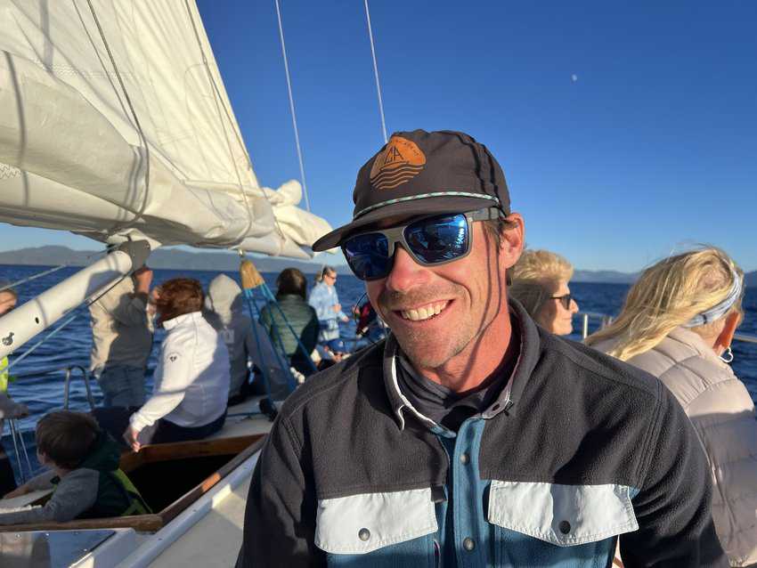 image of sail boat on an evening sail with captain Austin on the Tahoe Sailing Charter. 