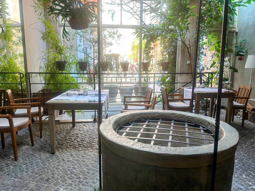 An old well preserved in the Art Hotel's restaurant.