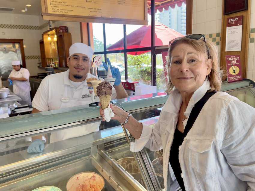 Author enjoying a Rocky Road ice cream cone at Fenton’s Creamery.