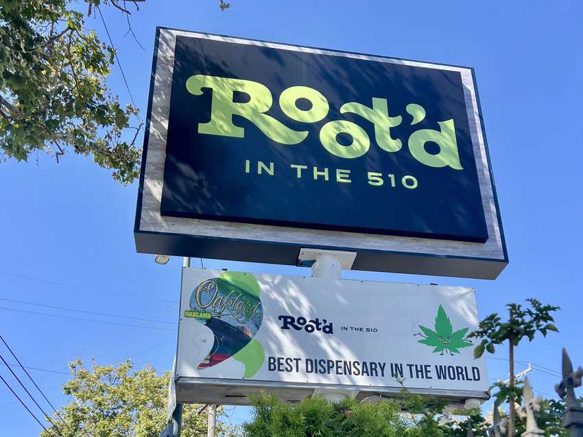 Exterior sign on the street corner of Root'd in the 510. 