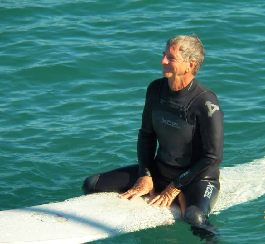 Self actualization. Surfer ready to catch a wave in Newport Beach. Photo by Noreen Kompanik