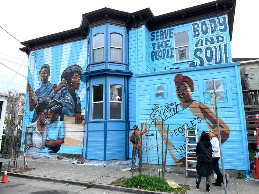 Colorful mural depicting the Women of the Black Panther Party in West Oakland.