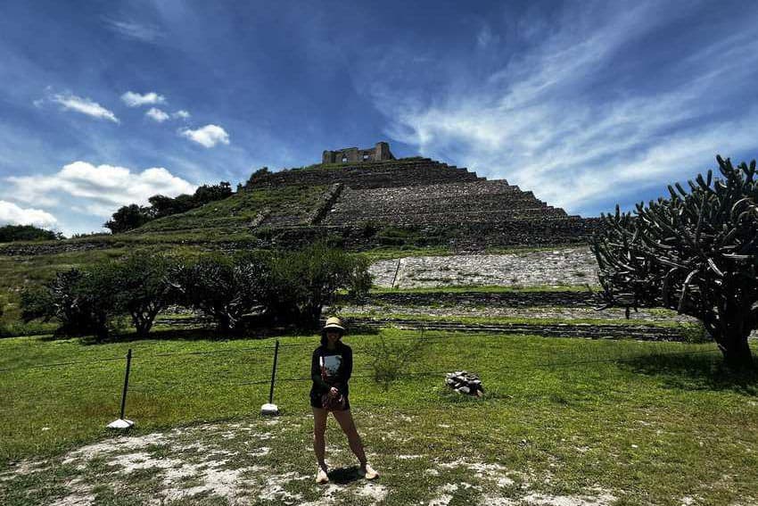 The author in front of La Pirámide del Cerrito in Querétaro.